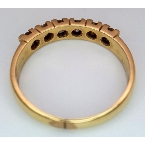 130 - An 18K Yellow Gold (tested) Six Diamond Ring. 0.6ctw. Size U. 4.6g total weight. Ref: STK019786