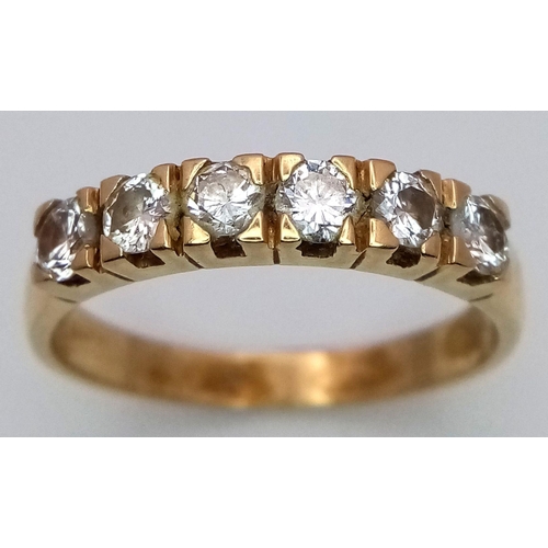 130 - An 18K Yellow Gold (tested) Six Diamond Ring. 0.6ctw. Size U. 4.6g total weight. Ref: STK019786