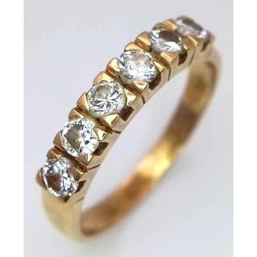 130 - An 18K Yellow Gold (tested) Six Diamond Ring. 0.6ctw. Size U. 4.6g total weight. Ref: STK019786