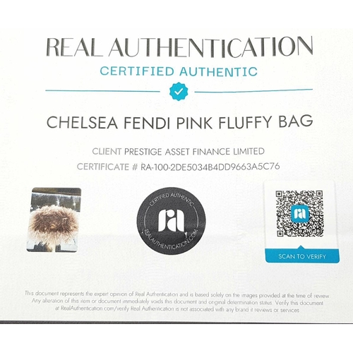 146 - A Fendi Pink Shearling Baguette Bag. Pink shearling exterior with silver-toned hardware and a single... 