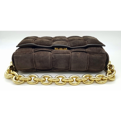 52 - A Bottega Veneta Dark Brown Suede Chain Cassette Bag. Dark brown suede exterior with gold-toned chai... 