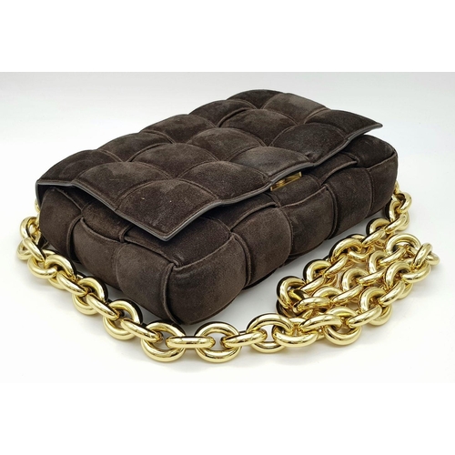 52 - A Bottega Veneta Dark Brown Suede Chain Cassette Bag. Dark brown suede exterior with gold-toned chai... 