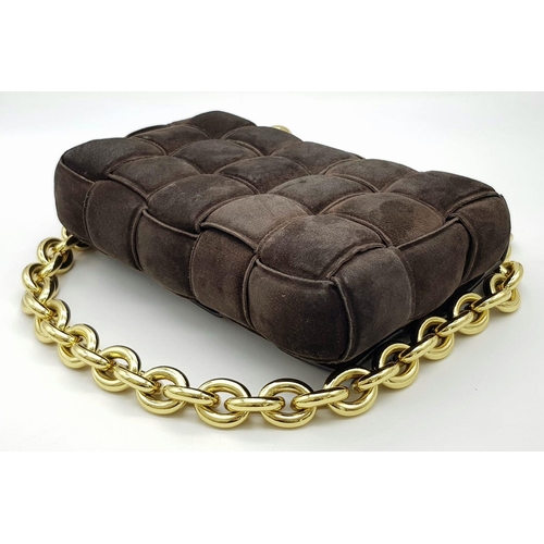 52 - A Bottega Veneta Dark Brown Suede Chain Cassette Bag. Dark brown suede exterior with gold-toned chai... 