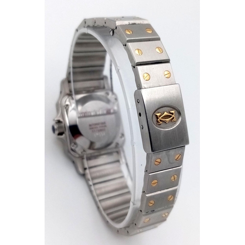 55 - A Cartier Bi-Metal Santos Ladies Watch. Early 90s model. Gold and stainless steel bracelet and case ... 