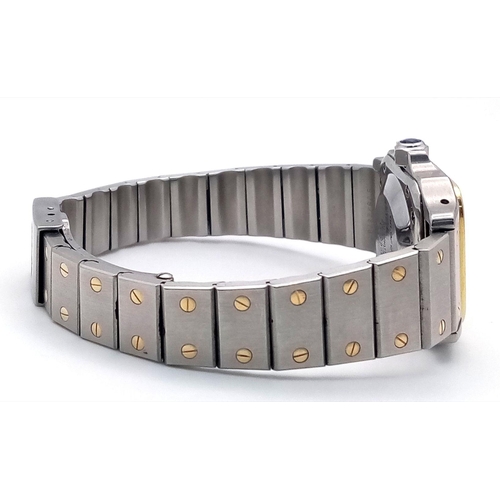 55 - A Cartier Bi-Metal Santos Ladies Watch. Early 90s model. Gold and stainless steel bracelet and case ... 