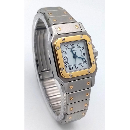 55 - A Cartier Bi-Metal Santos Ladies Watch. Early 90s model. Gold and stainless steel bracelet and case ... 