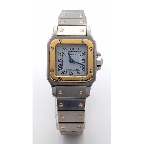 55 - A Cartier Bi-Metal Santos Ladies Watch. Early 90s model. Gold and stainless steel bracelet and case ... 