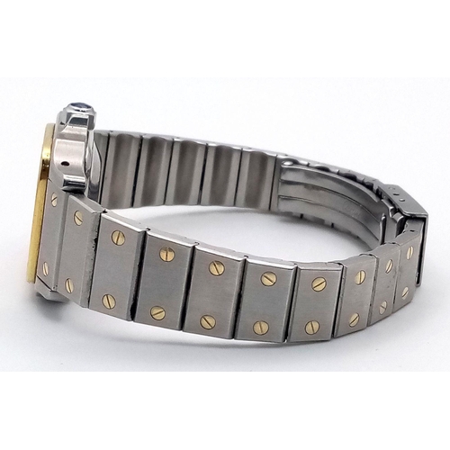 55 - A Cartier Bi-Metal Santos Ladies Watch. Early 90s model. Gold and stainless steel bracelet and case ... 