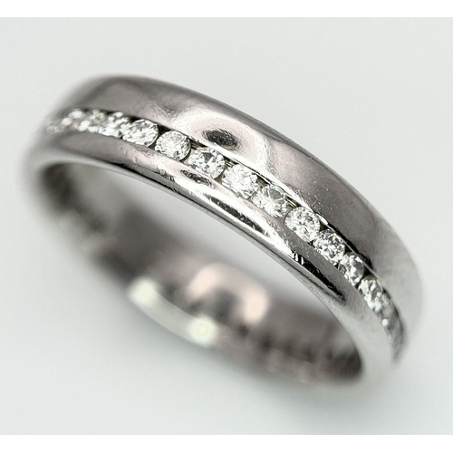 67 - A PLATINUM DIAMOND BAND RING 0.50CT 8.6G TOTAL WEIGHT, SIZE Q. Ref: SC 8074