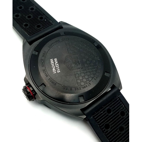 69 - A Tag Heuer Formula Calibre 5 Automatic Gents Watch. Black rubber strap. Steel case - 41mm. Black di... 