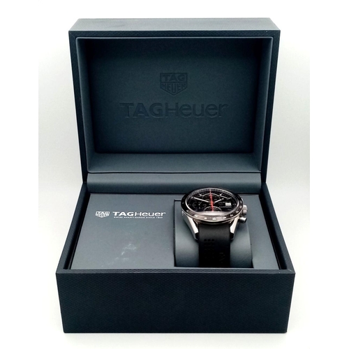 73 - A Tag Heuer Calibre 16 Carrera Automatic Gents Watch. Black rubber strap. Case - 42mm. Black dial wi... 