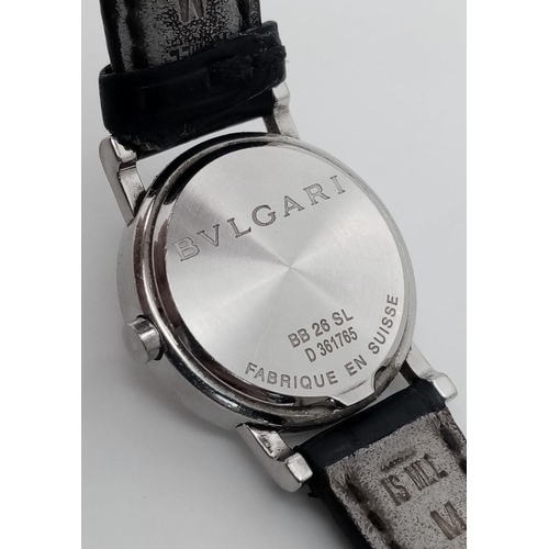 76 - A Bvlgari Quartz Ladies Watch. Black leather strap. Stainless steel case - 27mm. White dial with dat... 