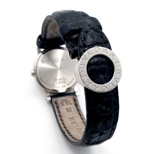 76 - A Bvlgari Quartz Ladies Watch. Black leather strap. Stainless steel case - 27mm. White dial with dat... 