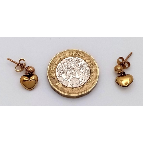 119 - Extremely attractive 9 carat GOLD BOMBE DROP EARRINGS. Heart Shaped. Presented in jewellers earring ... 