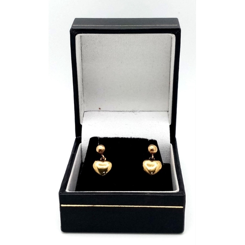 119 - Extremely attractive 9 carat GOLD BOMBE DROP EARRINGS. Heart Shaped. Presented in jewellers earring ... 