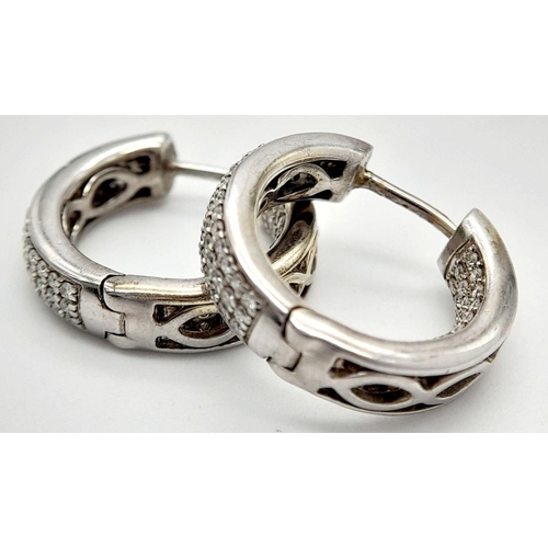 122 - A 9K WHITE GOLD DIAMOND SET HOOP EARRINGS 0.80CT . 7G TOTAL WEIGHT , APPROX 1.5CM DIAMETER. Ref: JB ... 