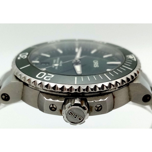 123 - An Oris Aquis Divers Automatic Watch. Stainless steel bracelet and case - 42mm. Vivid green dial wit... 