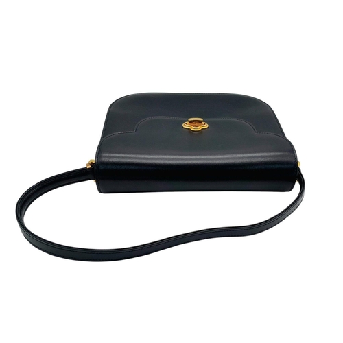 214 - A Bally Navy Blue Leather Shoulder Bag. Navy blue leather exterior with gold-toned hardware, a singl... 