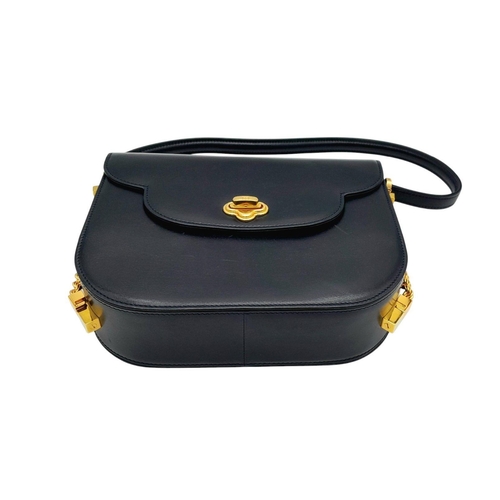 214 - A Bally Navy Blue Leather Shoulder Bag. Navy blue leather exterior with gold-toned hardware, a singl... 