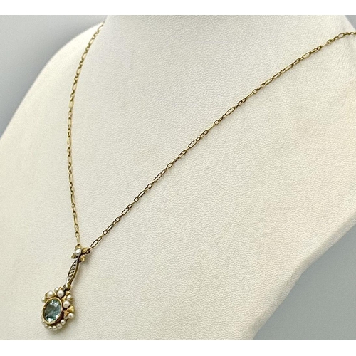 326 - An Antique 9K Gold, Aquamarine and Seed Pearl Pendant on a 9K Gold Necklace. 3cm and 42cm. 4.1g tota... 