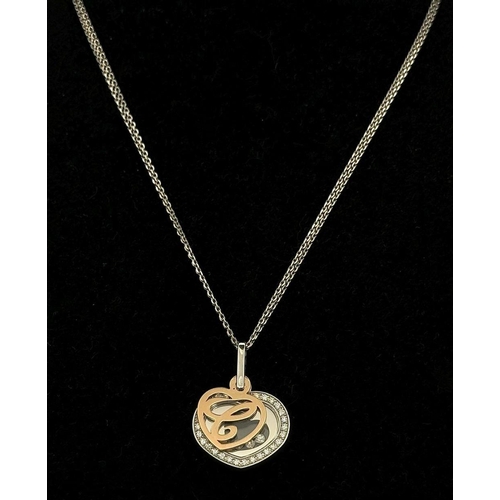 438 - A CHOPARD 18K WHITE AND ROSE GOLD HAPPY DIAMONDS PENDANT & DOUBLE ROW NECKLACE. COMES WITH CHOPARD O... 