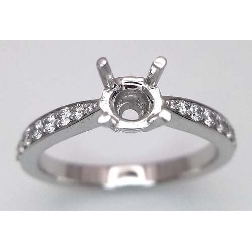 69 - A PLATINUM DIAMOND SET RING MOUNT READY TO HOLD YOUR DREAM STONE - WILL TAKE A 0.50CT ROUND STONE. 5... 