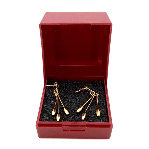 70 - Impressive pair of 9 carat GOLD ‘TULIP’ DROP EARRINGS. Having three stems on each earring. Complete ... 