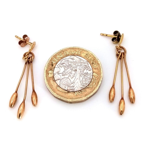 70 - Impressive pair of 9 carat GOLD ‘TULIP’ DROP EARRINGS. Having three stems on each earring. Complete ... 