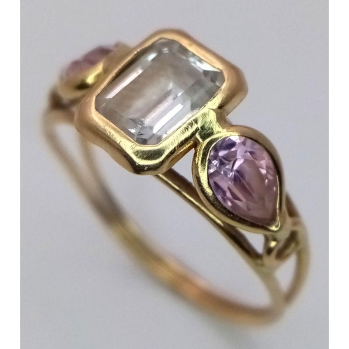 77 - Vintage 18 CARAT GOLD RING set with CRYSTAL QUARTZ and AMETHYST . Having Clear centre stone with PEA... 