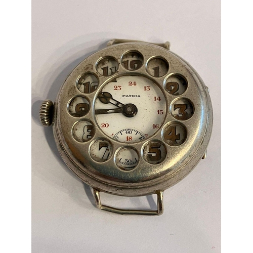 98 - Rare WWI PATRIA TRENCH WRISTWATCH. 15 Jewels. Rare left-handed winding. Protective ‘dial’ case. Subs... 