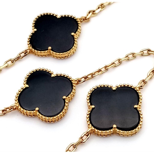 108 - An 18K Yellow Gold Black Onyx Lucky Clover Bracelet. 17cm. 
6.1g total weight. NLG93003