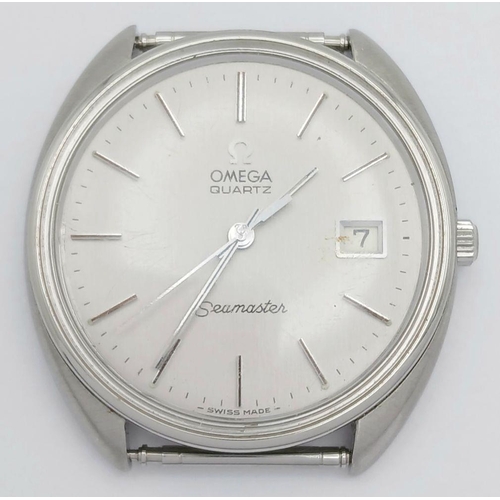 486 - A Vintage Omega Seamaster Watch Case - 36mm. Silver tone dial with date window. In working order.