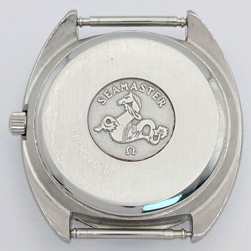 486 - A Vintage Omega Seamaster Watch Case - 36mm. Silver tone dial with date window. In working order.