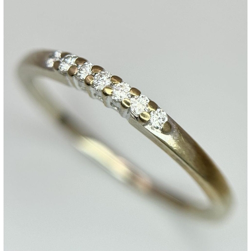 494 - A 14K YELLOW GOLD DIAMOND BAND RING 1.4G TOTAL WEIGHT, SIZE M 1/2. Ref: SC 8095