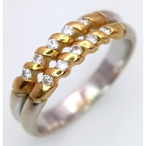 95 - AN 18K 2 COLOUR ( TESTED ) DIAMOND 2 ROW RING 3.7G TOTAL WEIGHT, SIZE N 1/2. Ref: SC 8079