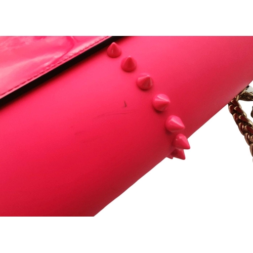 104 - A Christian Louboutin Pink Vara Bow Studded Shoulder Bag. Pink leather exterior with gold-toned stud... 