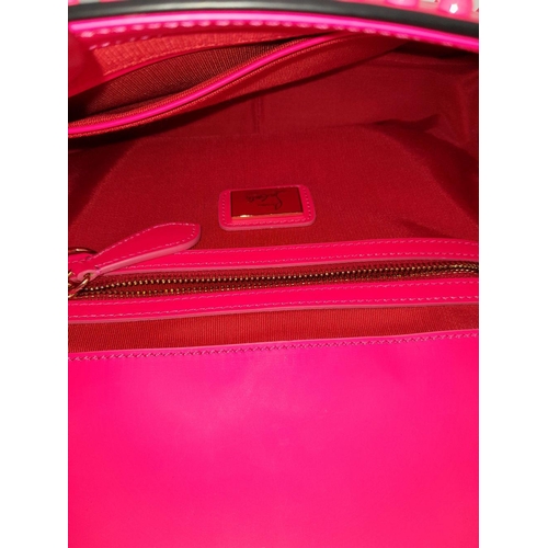 104 - A Christian Louboutin Pink Vara Bow Studded Shoulder Bag. Pink leather exterior with gold-toned stud... 