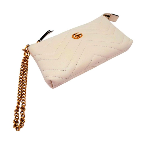 139 - A Gucci White GG Marmont Matelassé Mini Bag. White matelassé leather exterior with chevron stitching... 