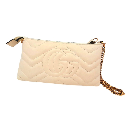 139 - A Gucci White GG Marmont Matelassé Mini Bag. White matelassé leather exterior with chevron stitching... 