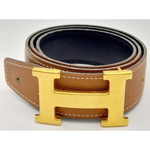 388 - An Hermès Brown Reversible H Belt. 84.5cm total length. Some signs of wear and tear. Please see phot... 