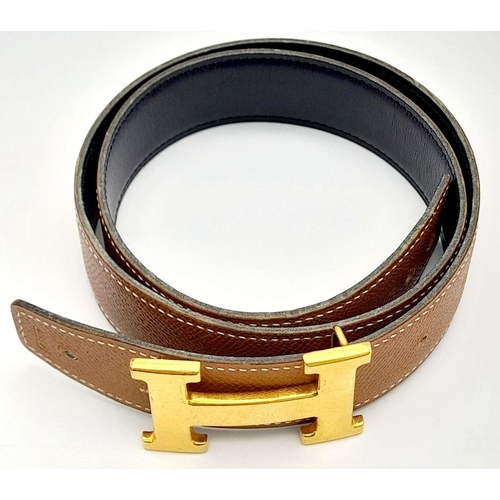 388 - An Hermès Brown Reversible H Belt. 84.5cm total length. Some signs of wear and tear. Please see phot... 