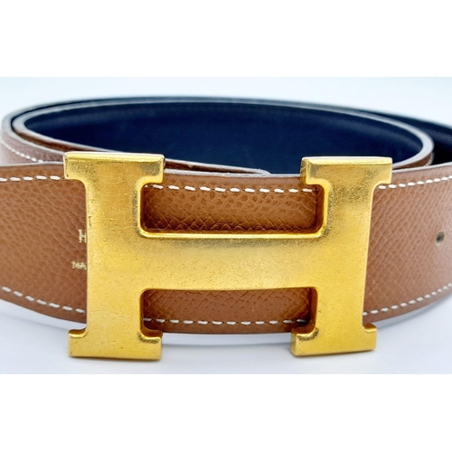 388 - An Hermès Brown Reversible H Belt. 84.5cm total length. Some signs of wear and tear. Please see phot... 