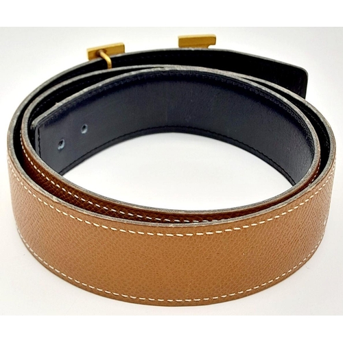 388 - An Hermès Brown Reversible H Belt. 84.5cm total length. Some signs of wear and tear. Please see phot... 