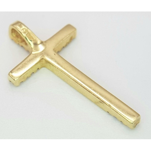 389 - AN 18K YELLOW GOLD DIAMOND SET CROSS 1.2G TOTAL WEIGHT, 1CM x 2.8CM. Ref: SC 8087