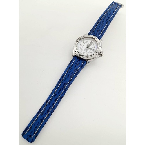 90 - A Breitling (A 71356) Ladies Quartz Watch. Blue leather strap. Stainless steel case - 32mm. Mother o... 