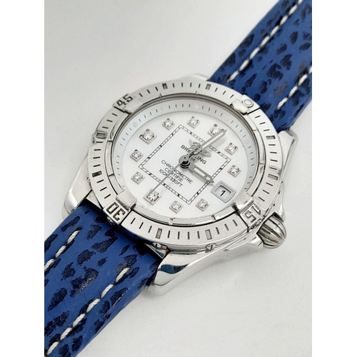 90 - A Breitling (A 71356) Ladies Quartz Watch. Blue leather strap. Stainless steel case - 32mm. Mother o... 