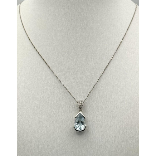 129 - A Beautiful Aquamarine and Diamond Pendant set in 18K White Gold on an 18K White Gold Disappearing N... 