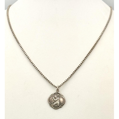 1278 - A sterling silver St Christopher pendant on silver box chain. Total weight 10.8G Total length 46cm.