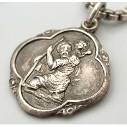 1278 - A sterling silver St Christopher pendant on silver box chain. Total weight 10.8G Total length 46cm.