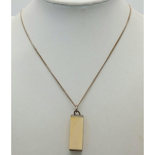 1279 - An antique 925 silver rectangular bone block pendant. Set on sterling silver chain. Total weight 7.6... 